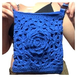 Small royal blue crochet cross body bag. In excellent condition.